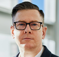 Alexander Hughes, CEO van een crypto trading bedrijf, portret